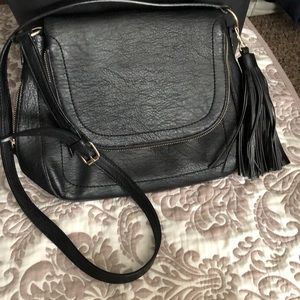 Black saddle bag with tassels